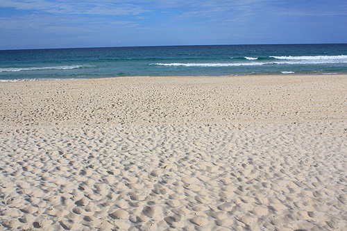 Sand surf and sky at the Gold Coast. photo