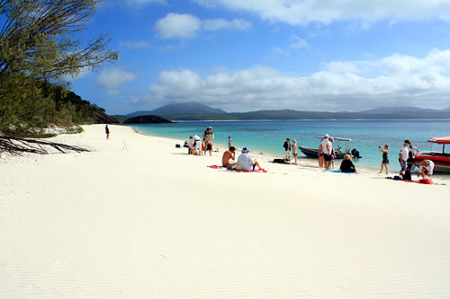 Tourist on Chalkies Beach Haslewood Island photo