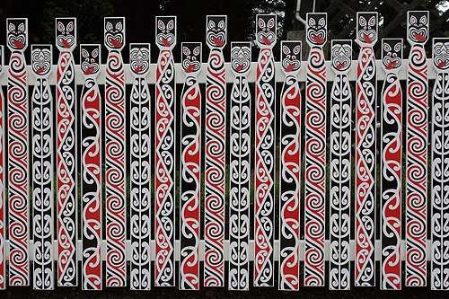 Maori Designs on Fence photo