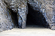 Cave at Bethells Beach photo