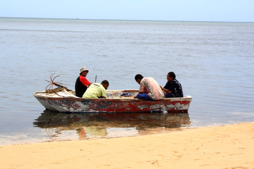 Fisherman on a boat photo